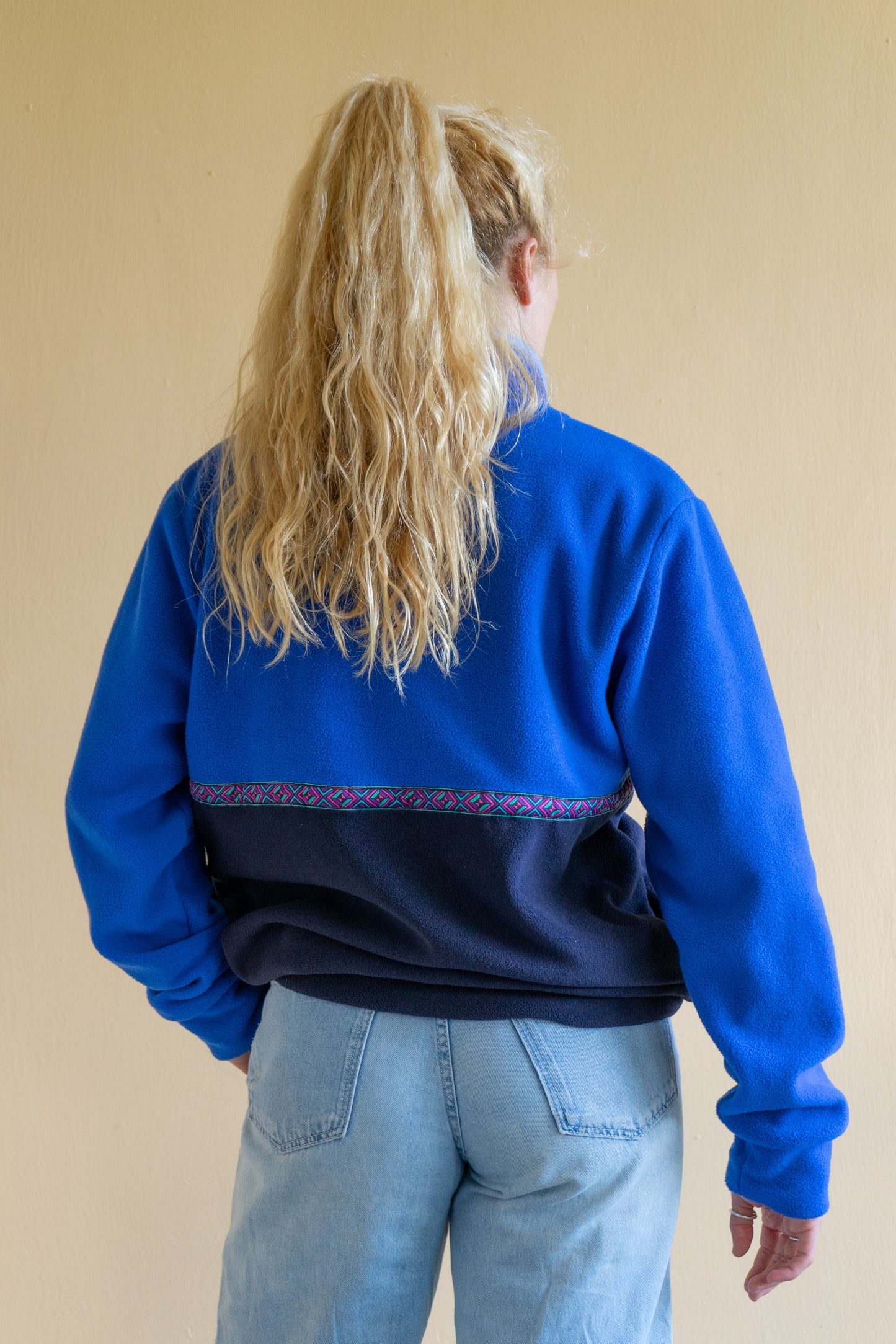 Surf style blue fleece. Retro blue fleece with ethnic trim